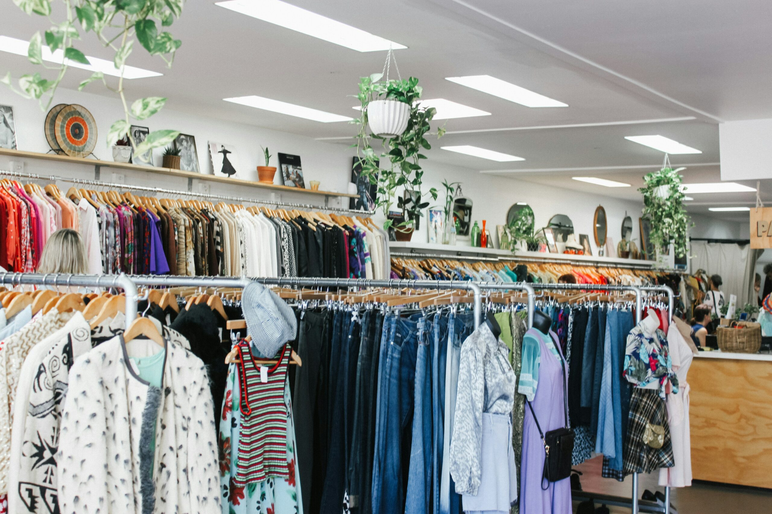 Stock Photo of inside of thrift store, showing racks of clothing